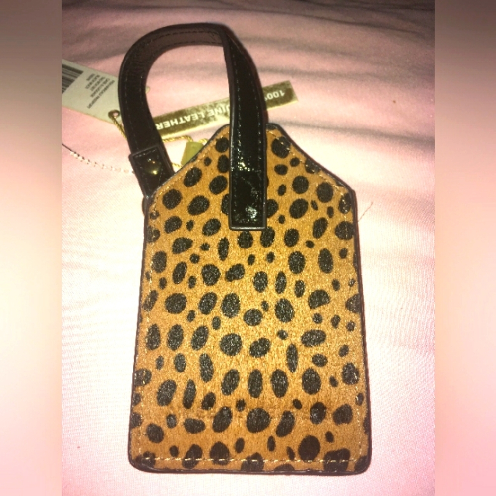 Luggage tag by aimme kestenberg